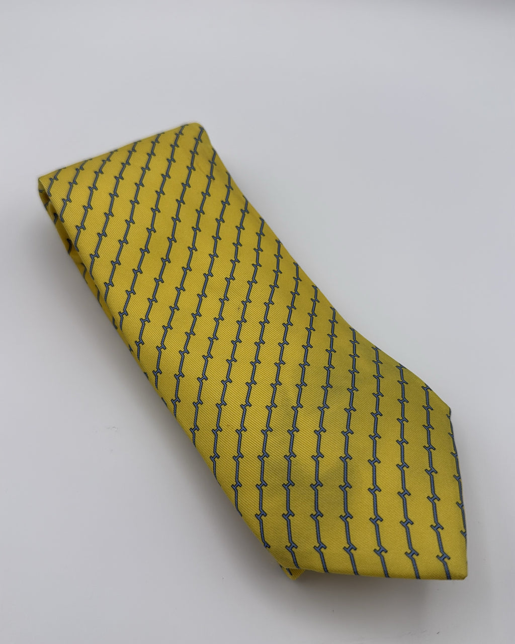 Hermès Paris Silk, Silk Tie 606085 FA Geometric Interlocking H Links Yellow Blue